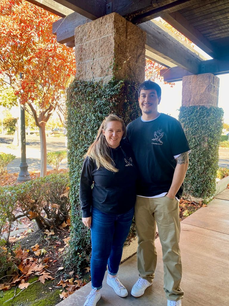 Two members of CycleBreakers Ministries standing together outdoors